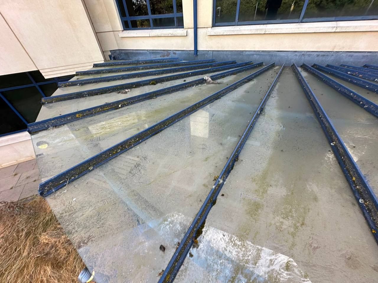 Dirty glass conservatory roof before cleaning