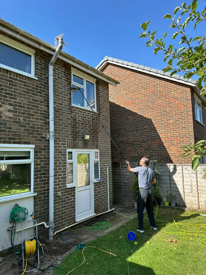 Reaching an upstairs window from a back garden